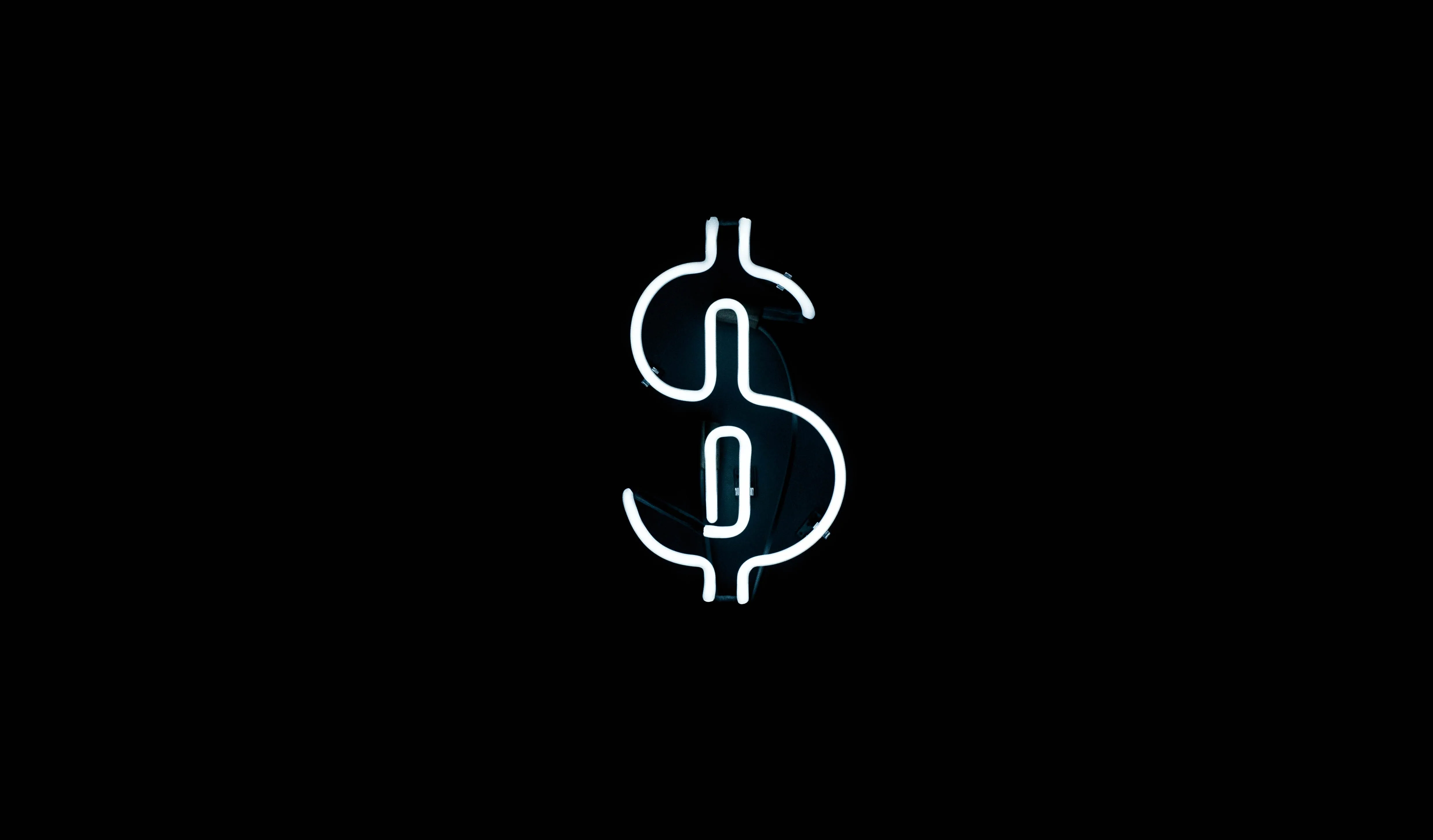 A white dollar sign drawn in neon lines on black
