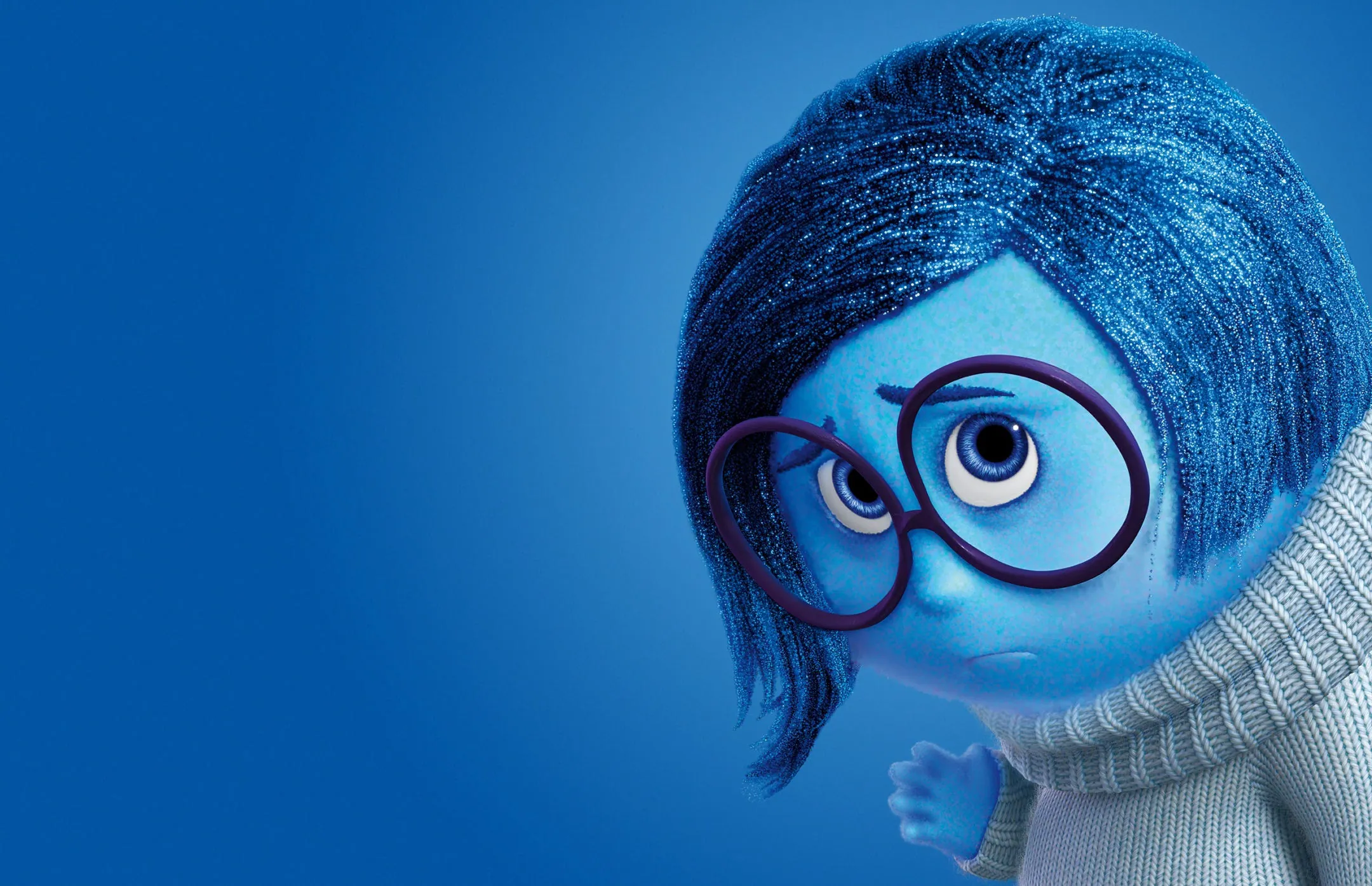 Sadness from Inside Out, with round glasses and a knitted sweater, peering in from the right on blue