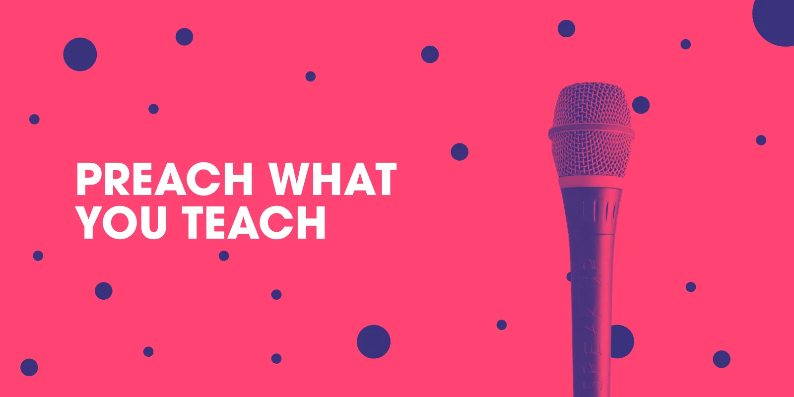 Preach what you teach, beside a microphone, on pink