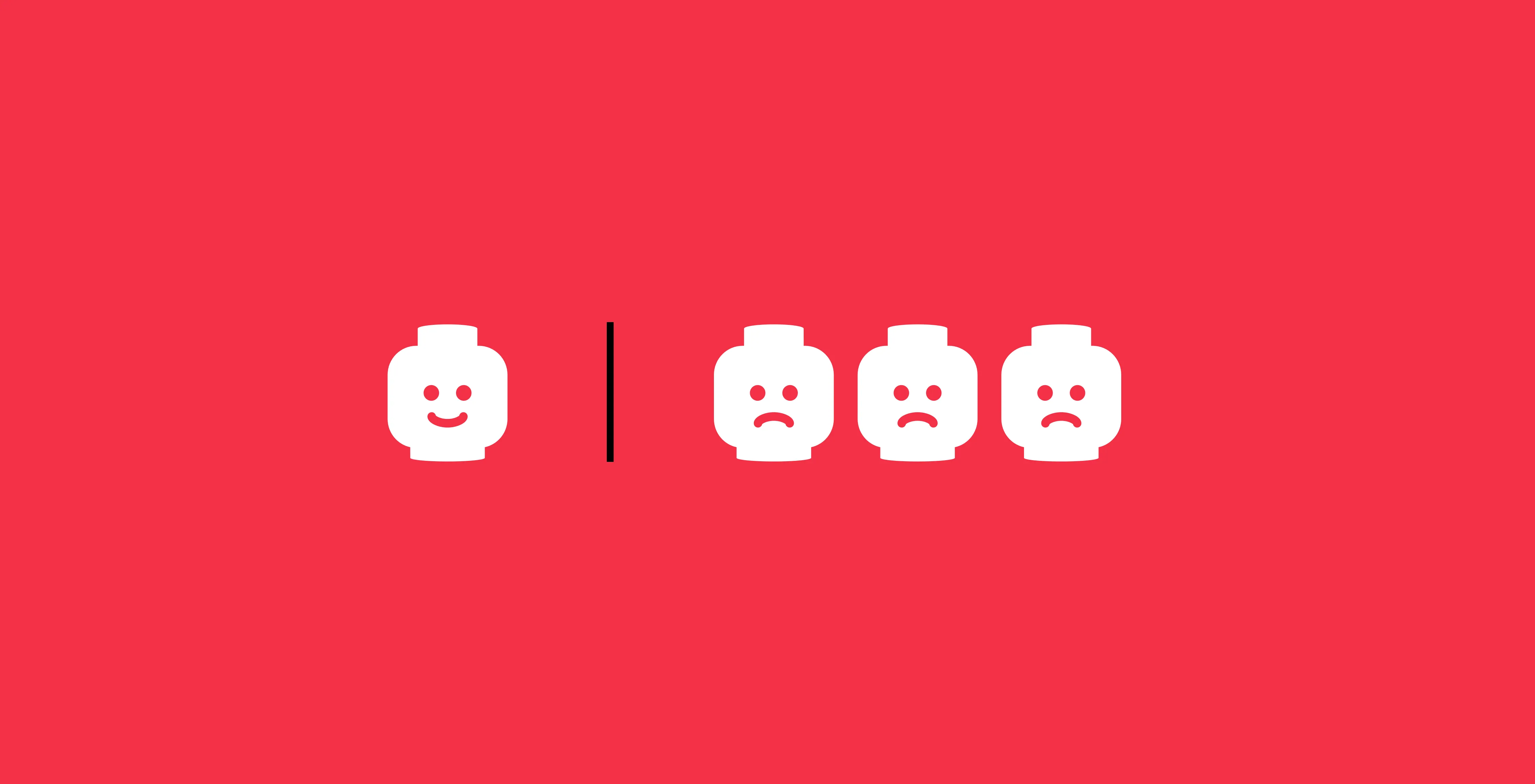 One smiling Lego head beside three frowning ones, white on red
