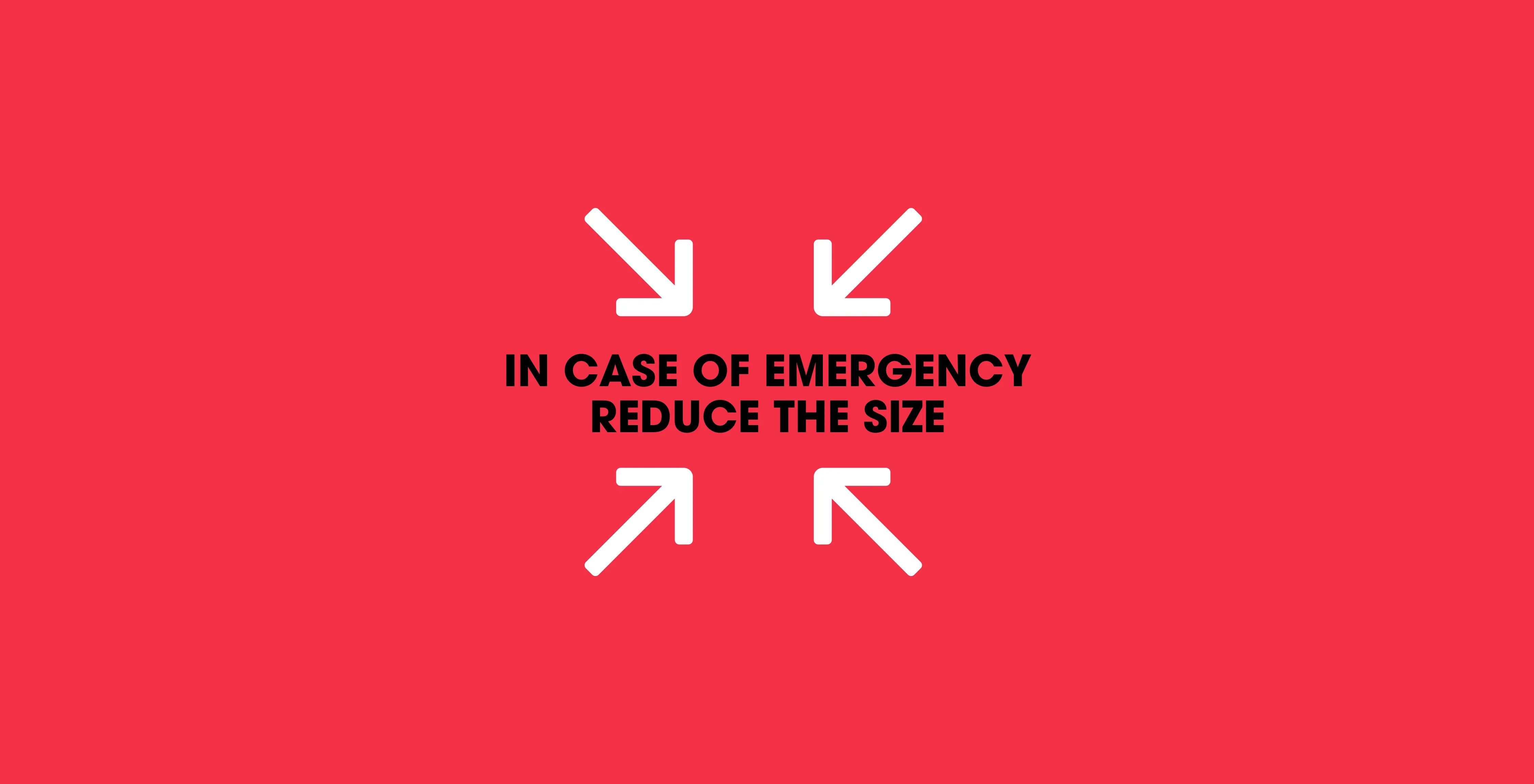 In case of emergency reduce the size, between four arrows pointing inwards, on red